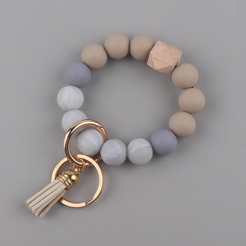 Llavero de muñeca con cuentas de silicona al por mayor